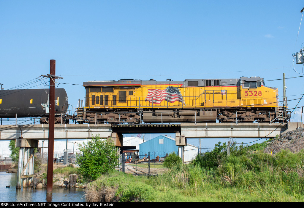 UP 5328 comes off the Neches River Lift Bridge